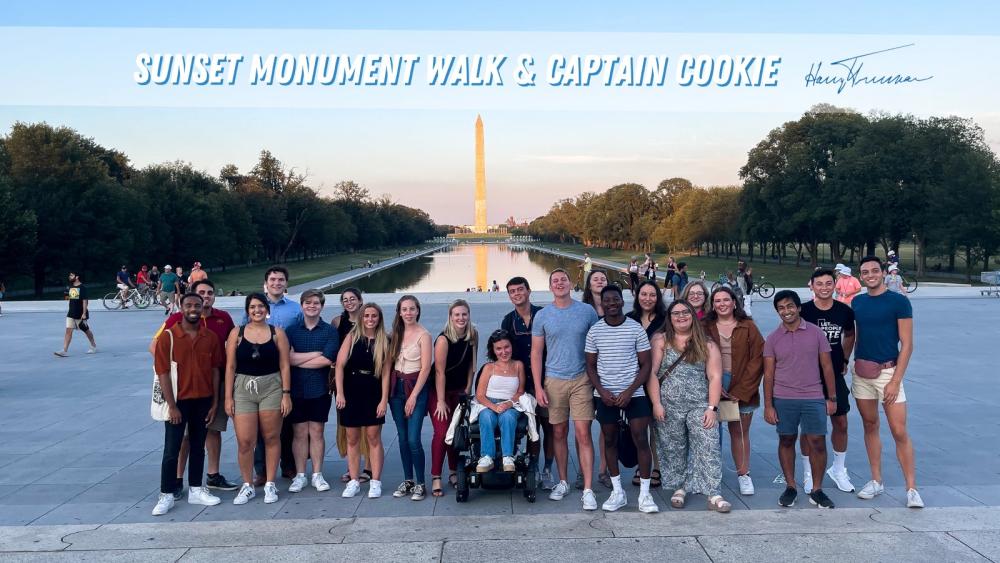 Scholars on a monument walk.